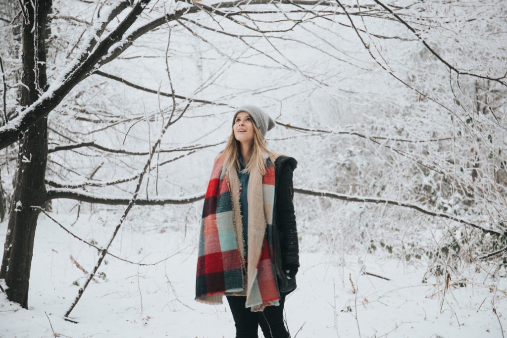 Young woman enjoying a winter landscape