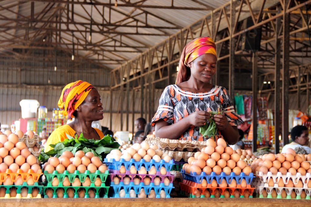 Rwandan women selling eggs at Kimironko Market