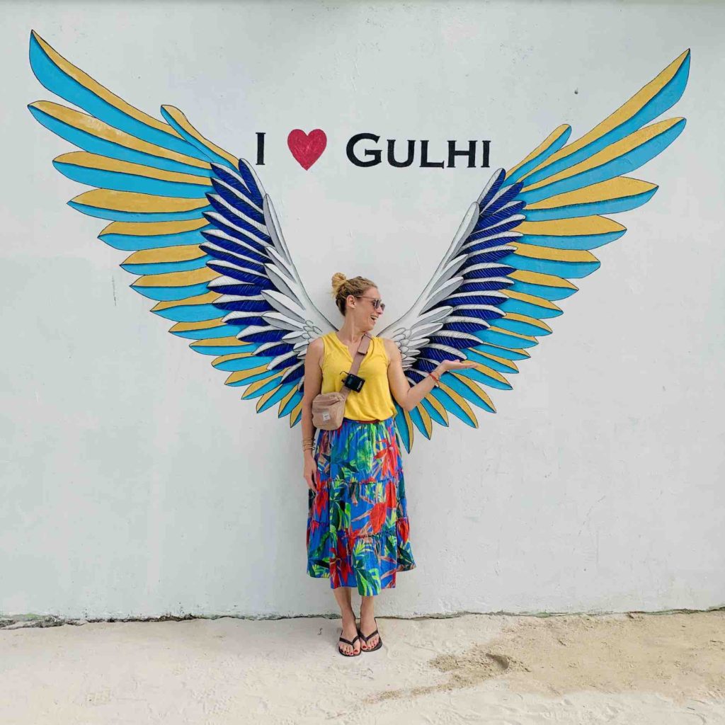 merry-in-front-of-street-art-gulhi-maldives