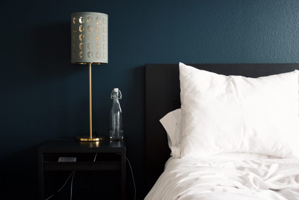 moody and cozy bedroom bliss with dark blue paint