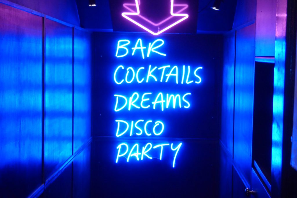Neon sign in a bar
