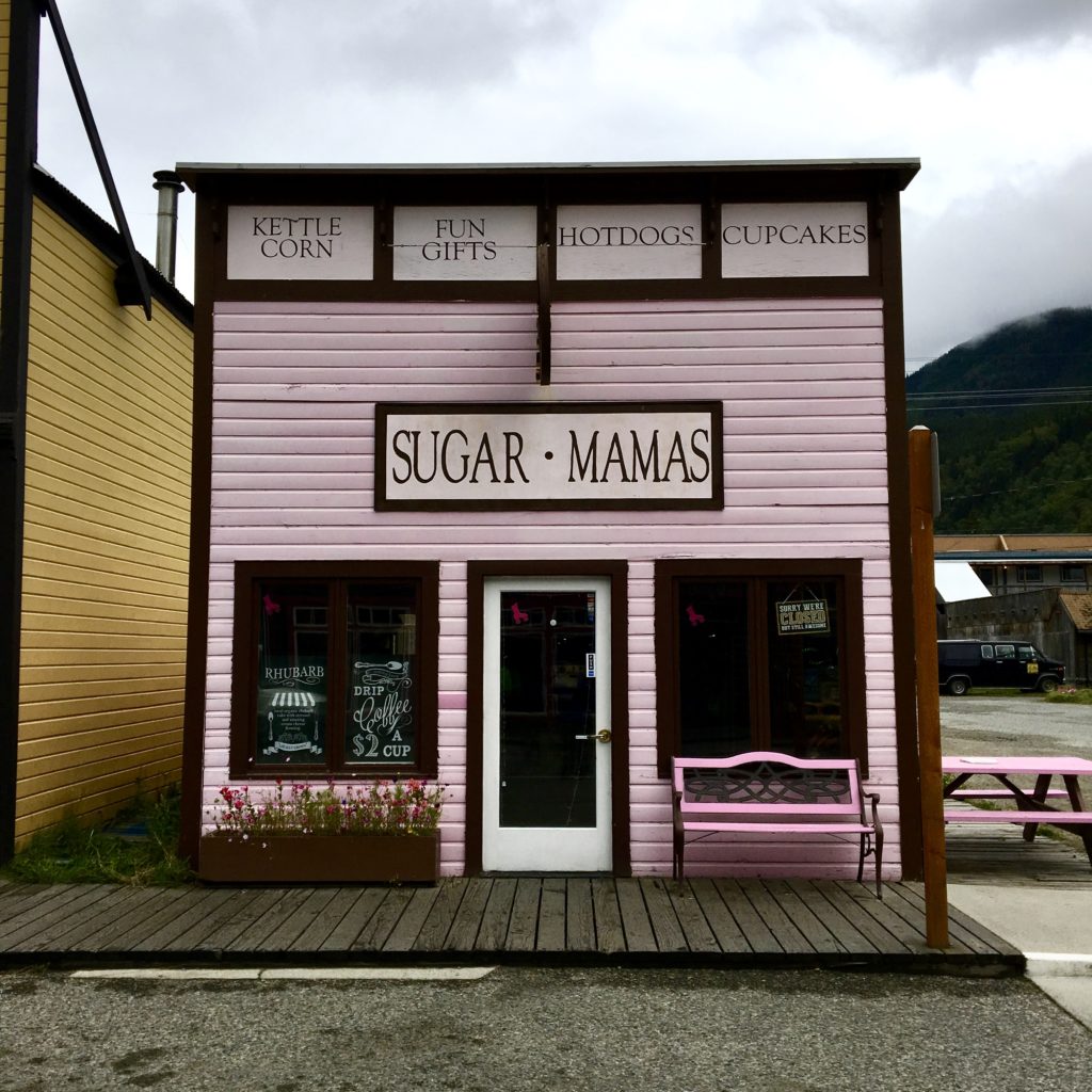 A local sweet shop with a bright pink exterior in Skagway, Alaska
