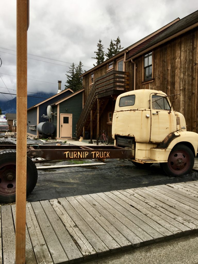 A pick up truck parked in downtown Skagway, Alaska