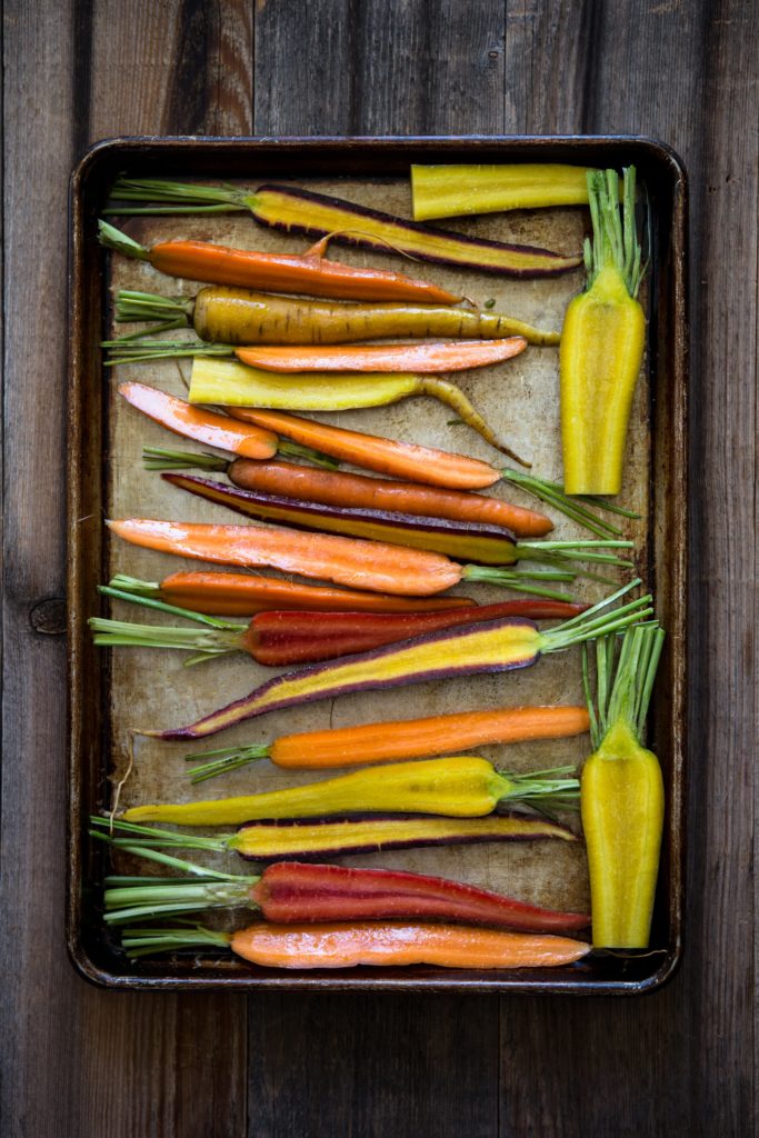 heirloom carrots on a cookie sheet
