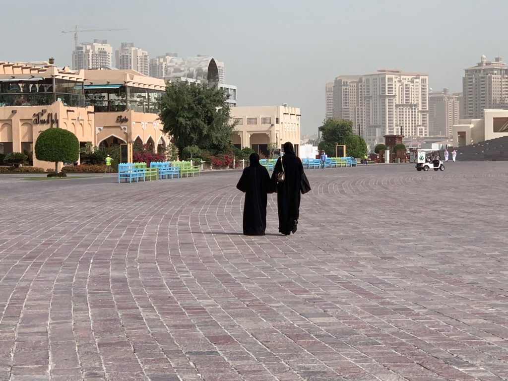 What-to-Do-in-Doha-women-enjoy-a-walk-on-the-promenade