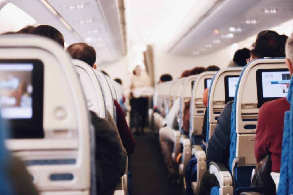 tips-to-help-you-travel-like-a-pro-airplane-cabin-backs-of-seats