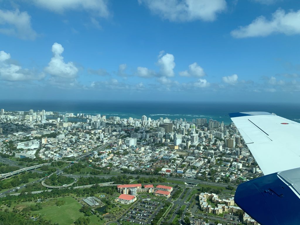 san-juan-from-airplane-window-fly-for-free-with-airline-miles