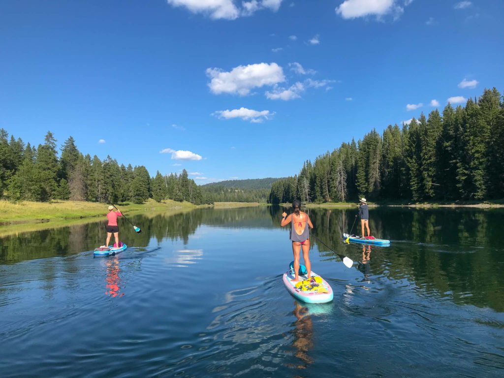 merry-and-friends-paddleboarding-down-the-snake-river-grand-tetons-national-park-wyoming
